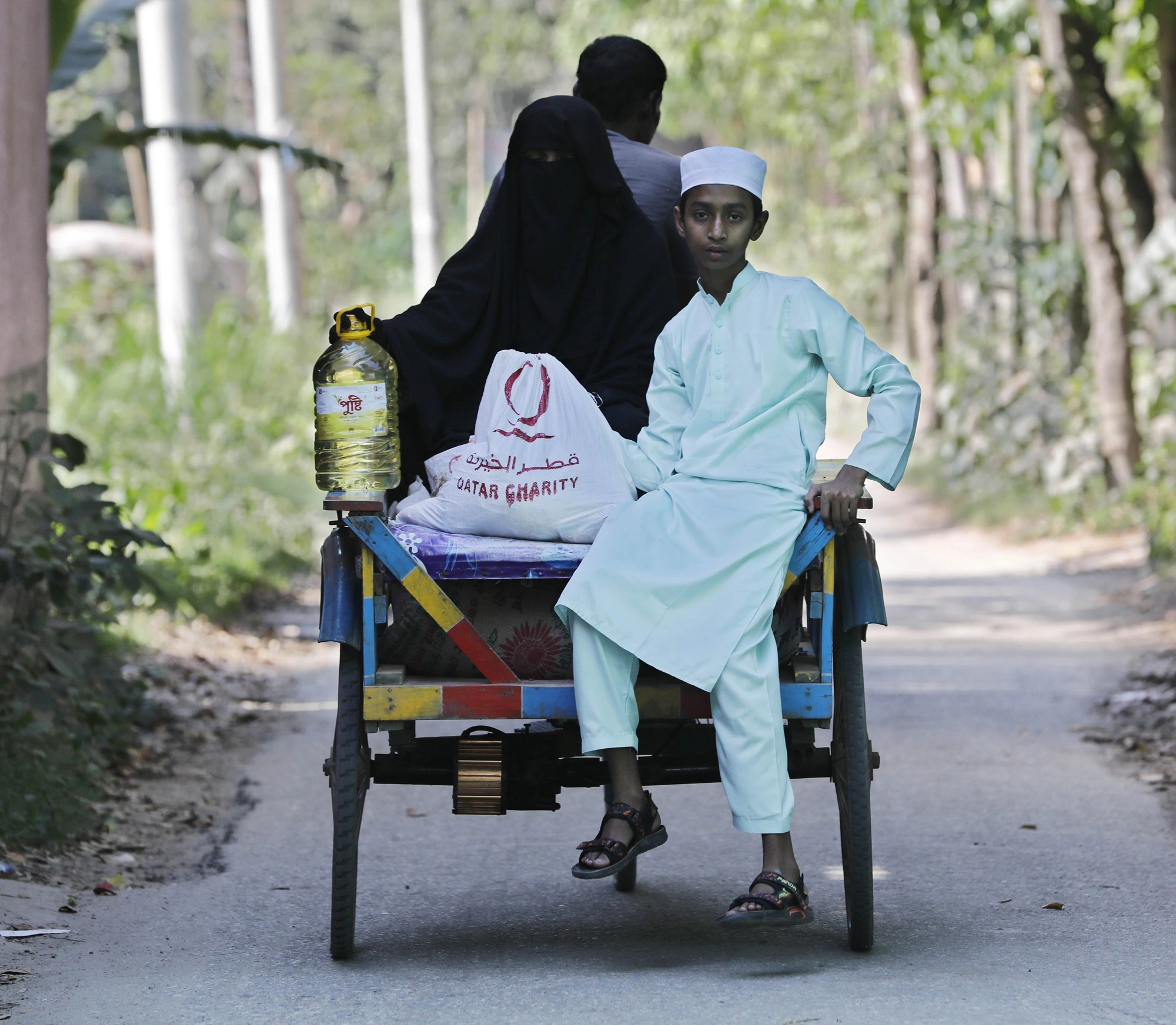 Qatar Charity Provides Winter Kits to Orphans and Families in Bangladesh