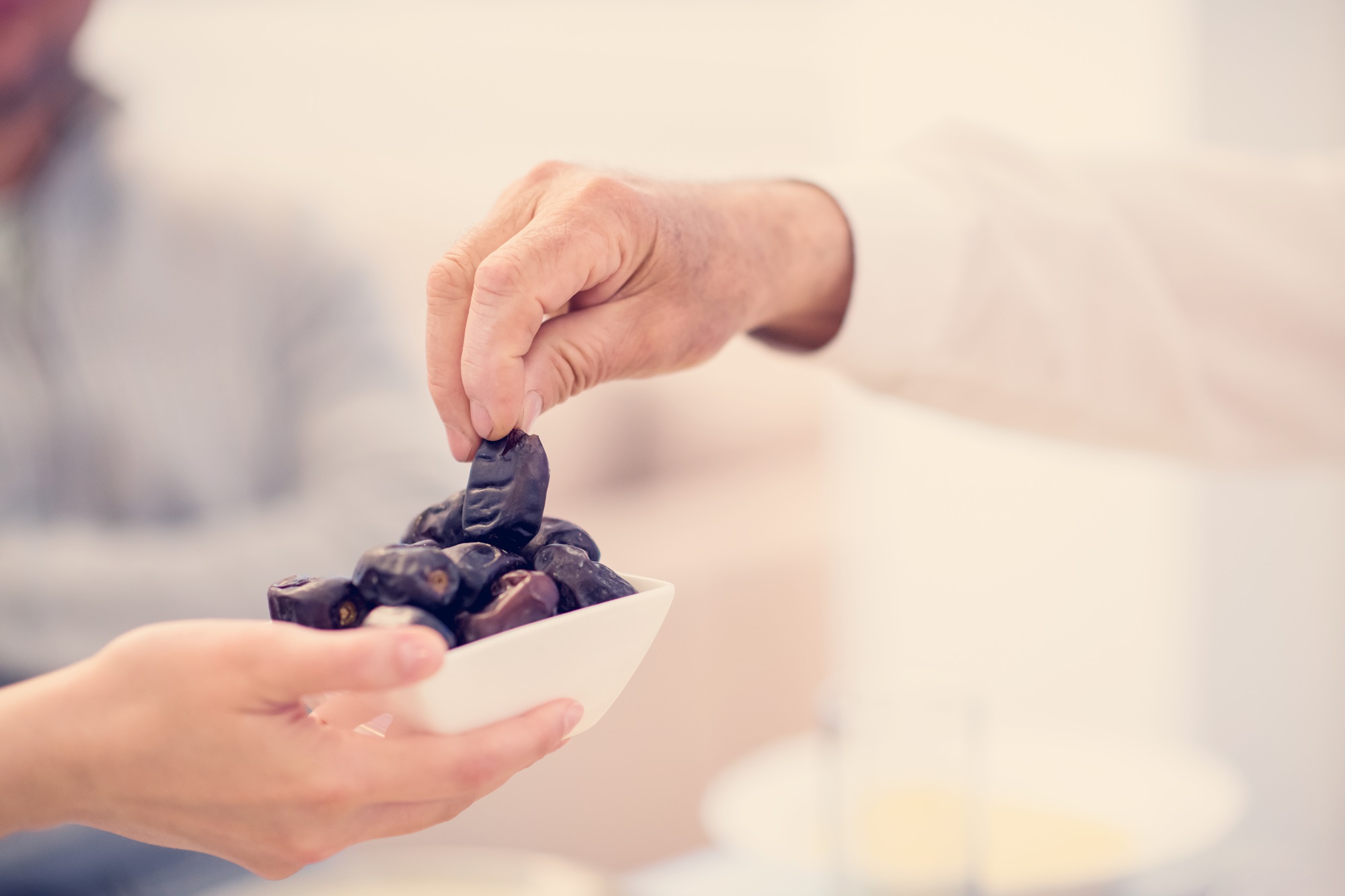 Iftar for a Fasting Person: Charity Benefits and its Impact on Society